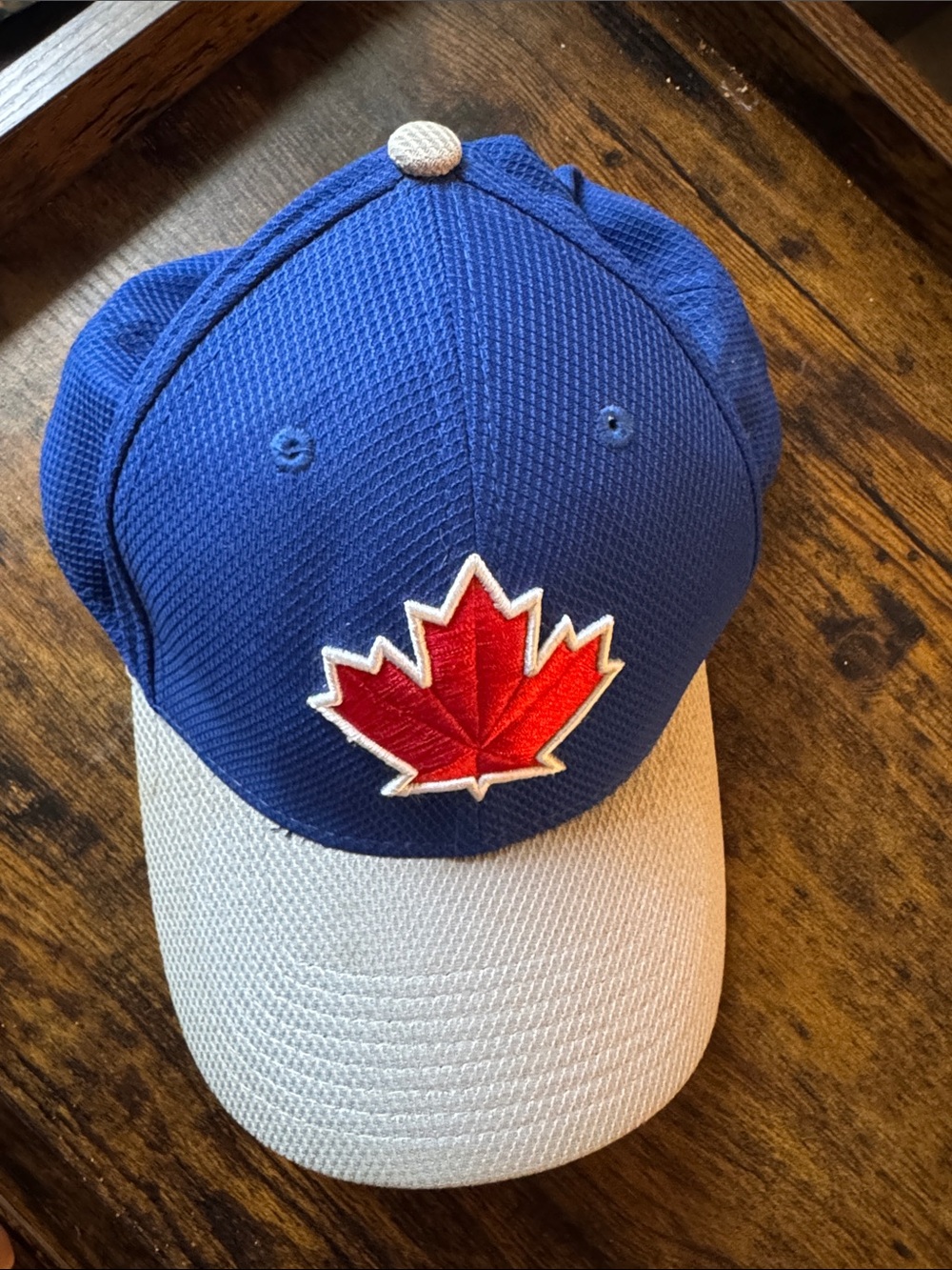 New Era Blue and White Cap with Red Maple Leaf Patch